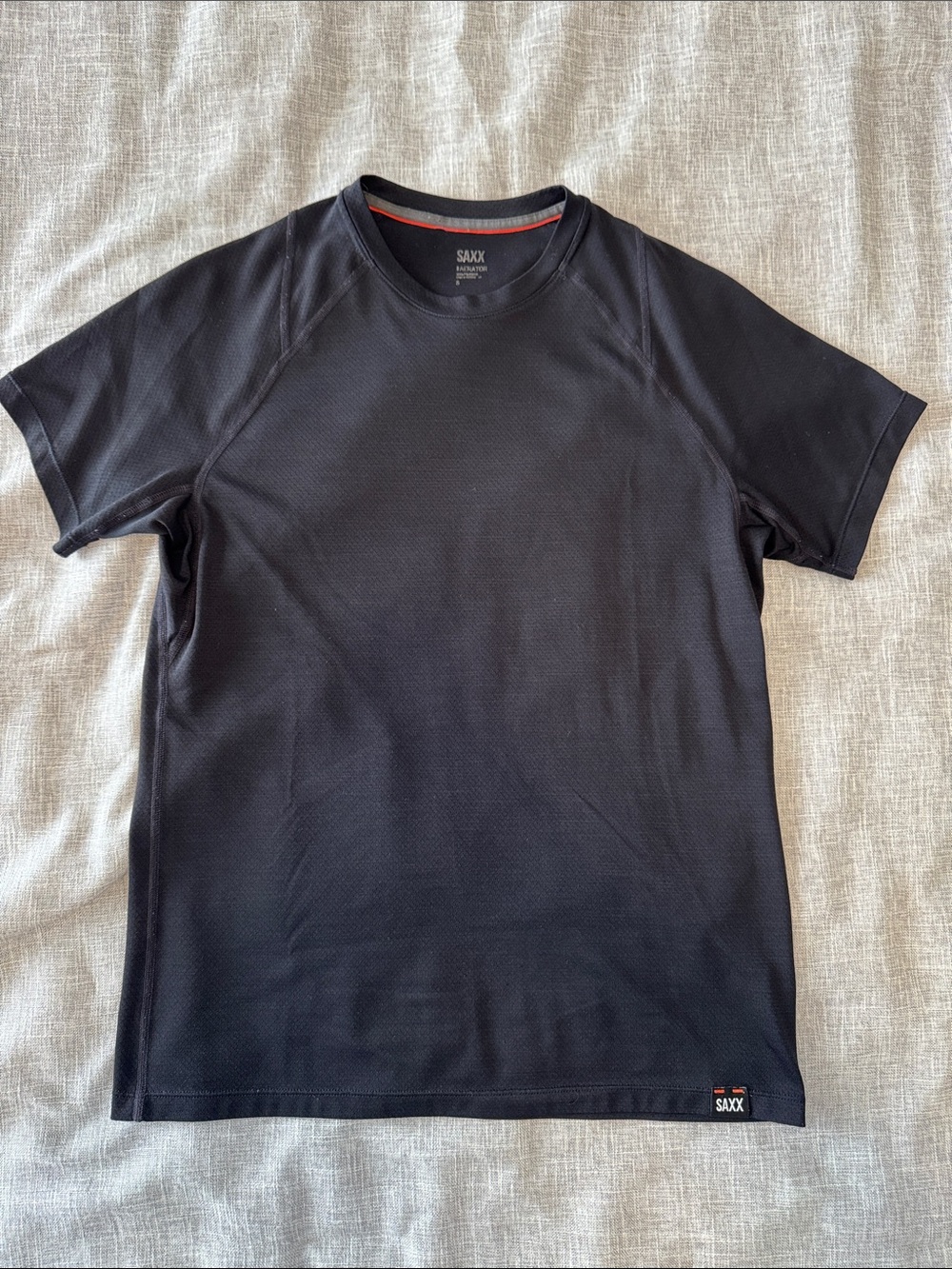 Saxx Aerator Black Short-Sleeve Performance Tee with Subtle Orange Trim